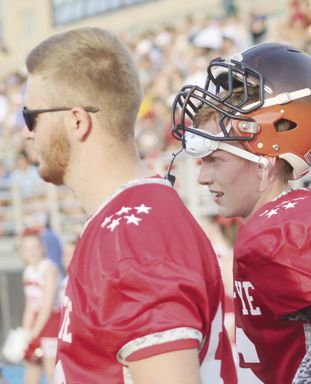 Corry’s Isaac Keeler with Tyler Jackson.